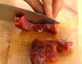 Memotong daging